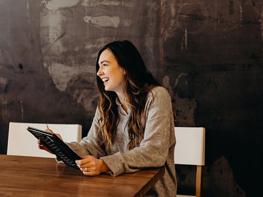 image (professional adult patient at work — invisalign clear aligners suitable for working professionals)